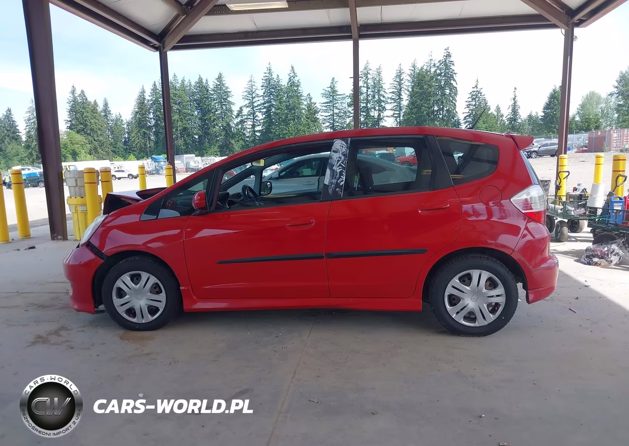 2009 Honda Fit Sport VIN:JHMGE884X9S053214 - 13