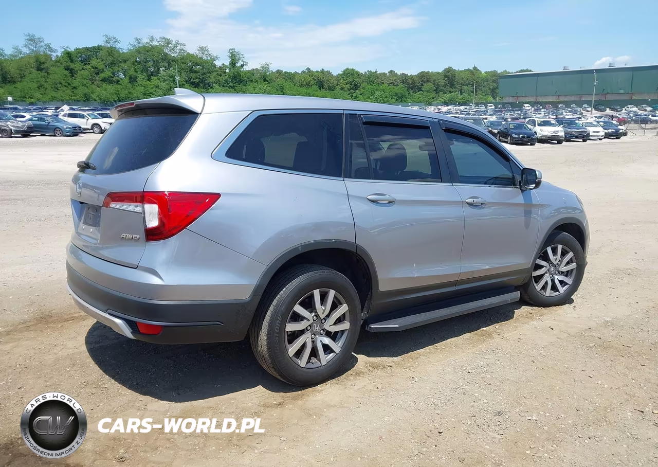 2022 Honda Pilot Awd Ex-L VIN:5FNYF6H55NB007491 - 4