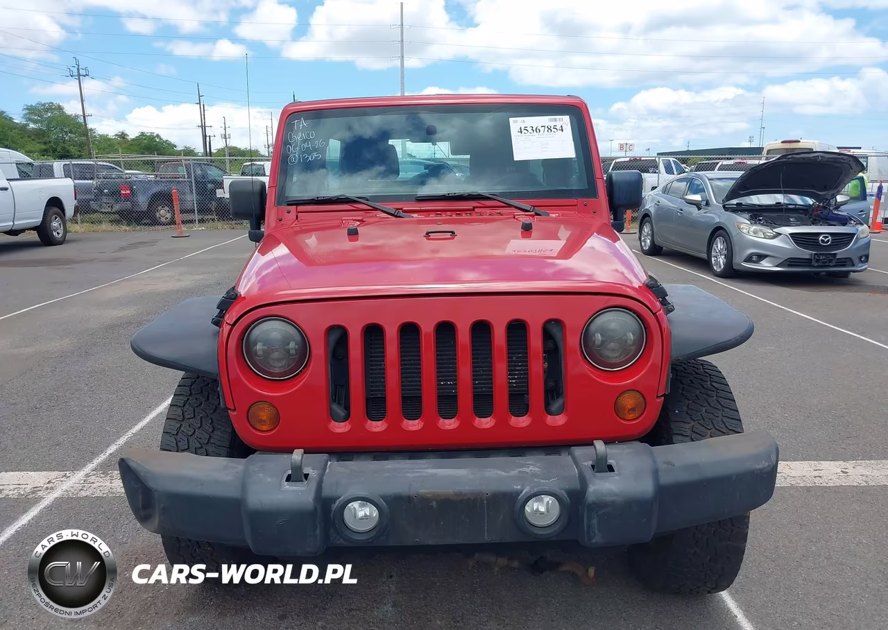 2012 Jeep Wrangler Unlimited Sport VIN:1C4BJWDGXCL210205 - 12