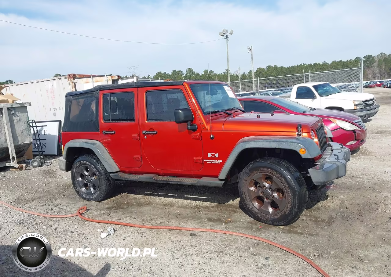 2009 Jeep Wrangler Unlimited X VIN:1J4GA39119L721989 - 12