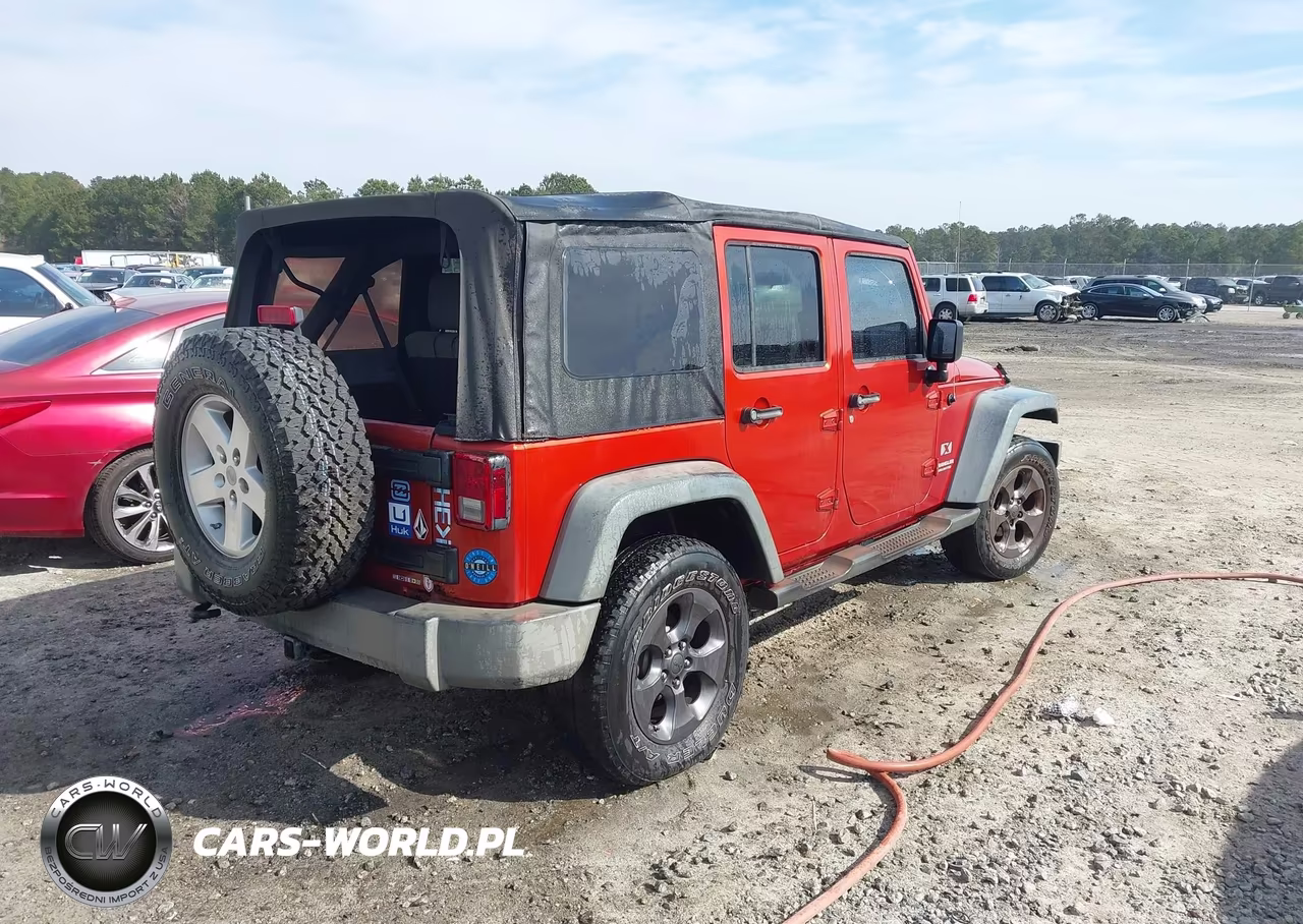 2009 Jeep Wrangler Unlimited X VIN:1J4GA39119L721989 - 4