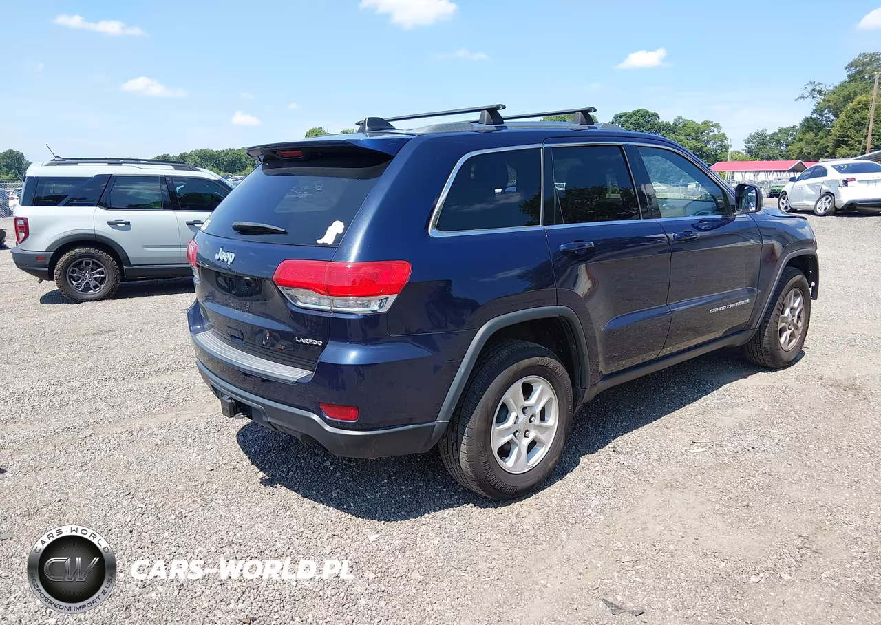 2015 Jeep Grand Cherokee Laredo VIN:1C4RJEAGXFC669509 - 4