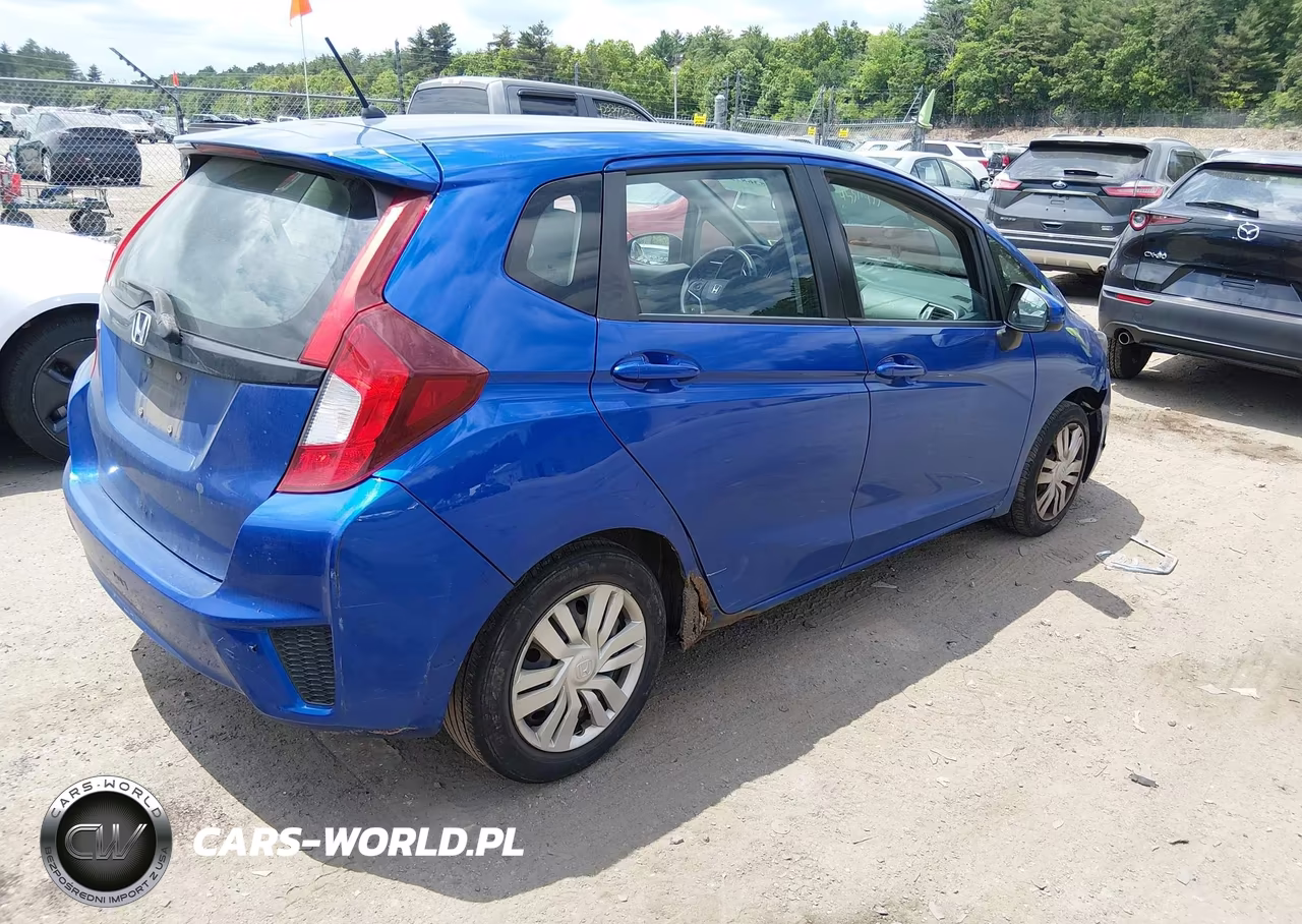2015 Honda Fit Lx VIN:3HGGK5H57FM719713 - 4