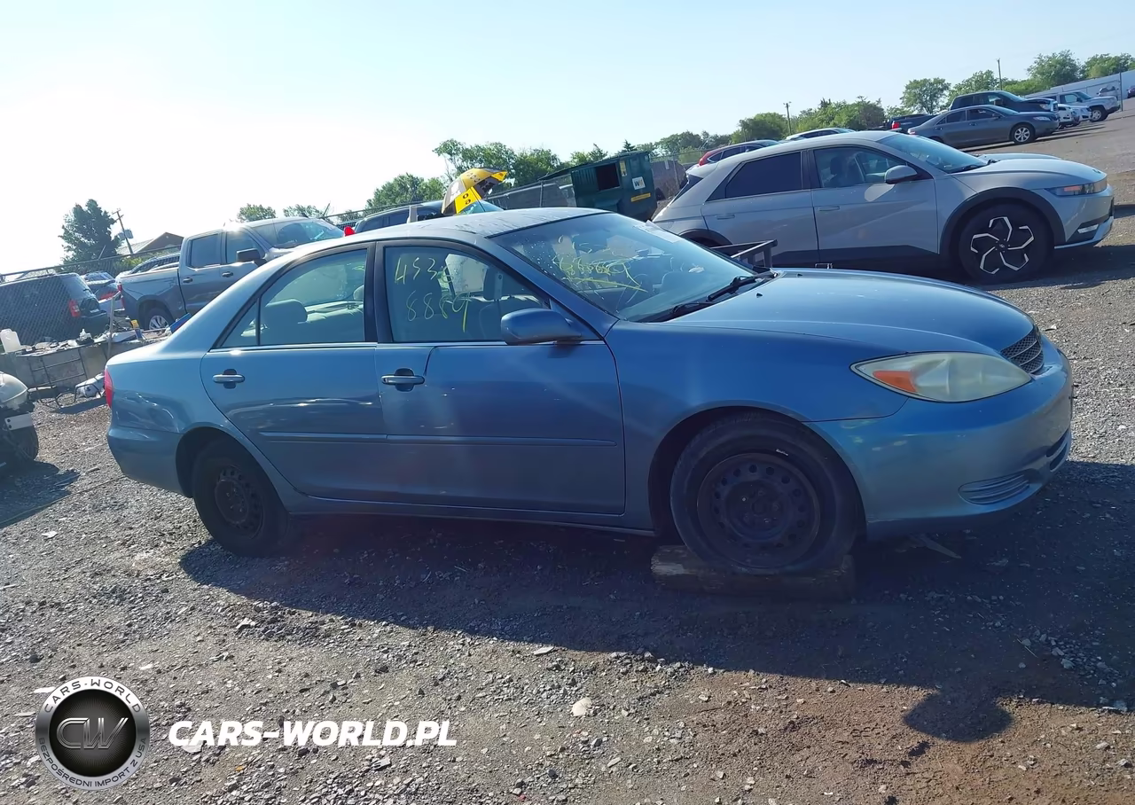 2002 Toyota Camry Le VIN:4T1BE32K22U516118 - 13