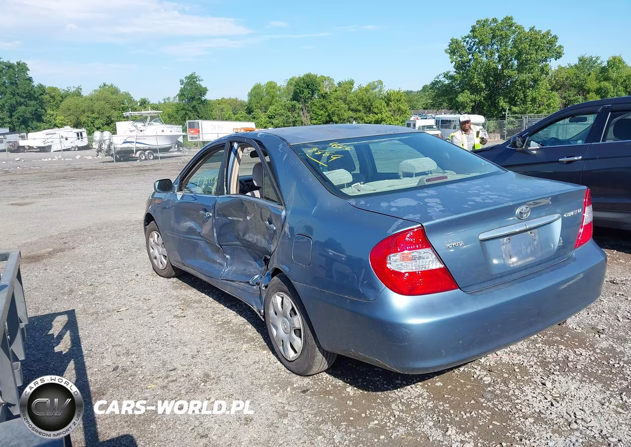 2002 Toyota Camry Le VIN:4T1BE32K22U516118 - 3