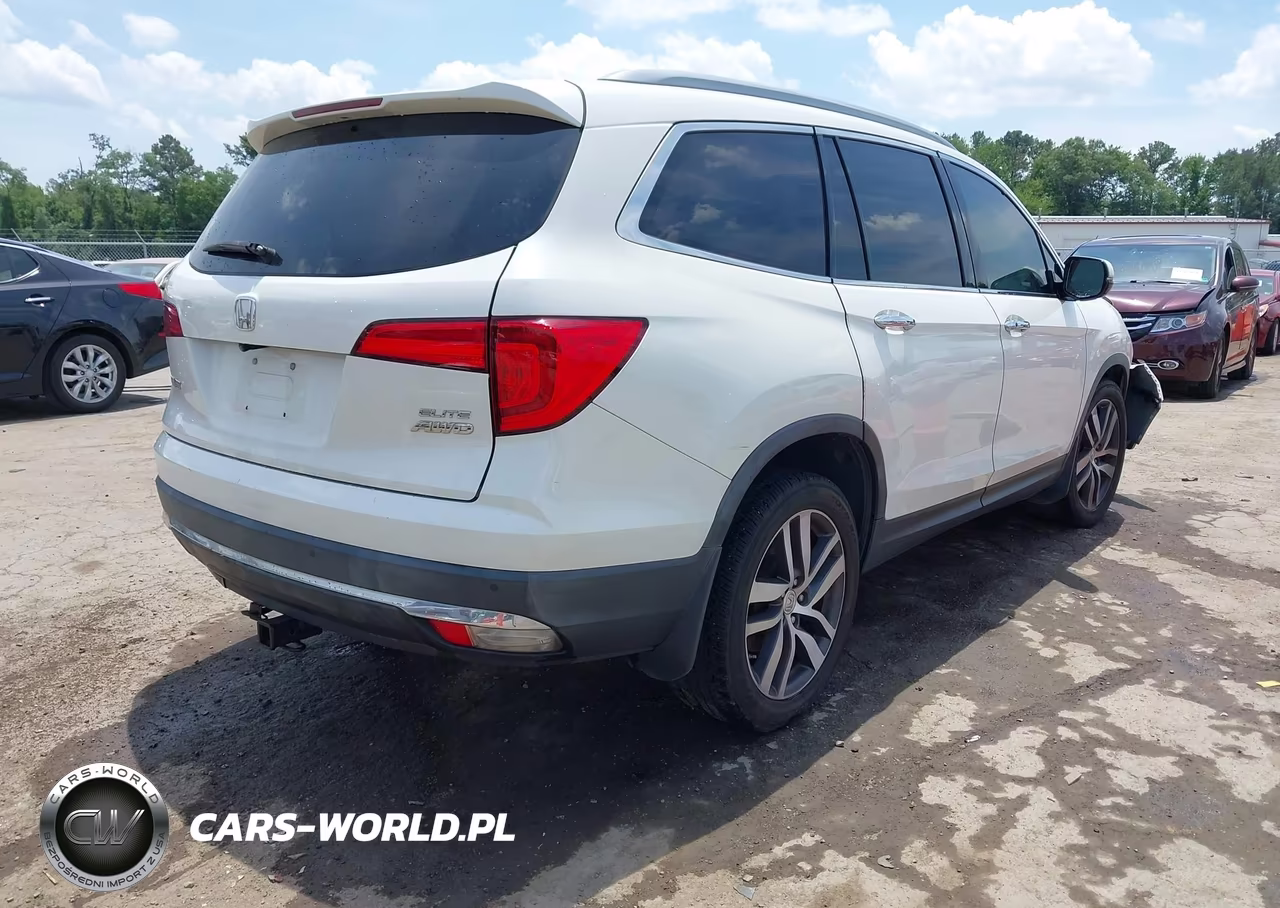 2018 Honda Pilot Elite VIN:5FNYF6H02JB069493 - 4