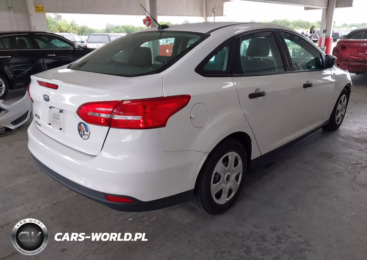 2017 Ford Focus S VIN:1FADP3E29HL281112 - 4