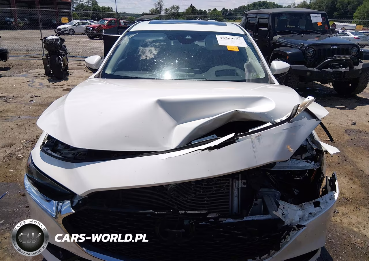 2022 Mazda Mazda3 Premium VIN:3MZBPBDL1NM305058 - 11