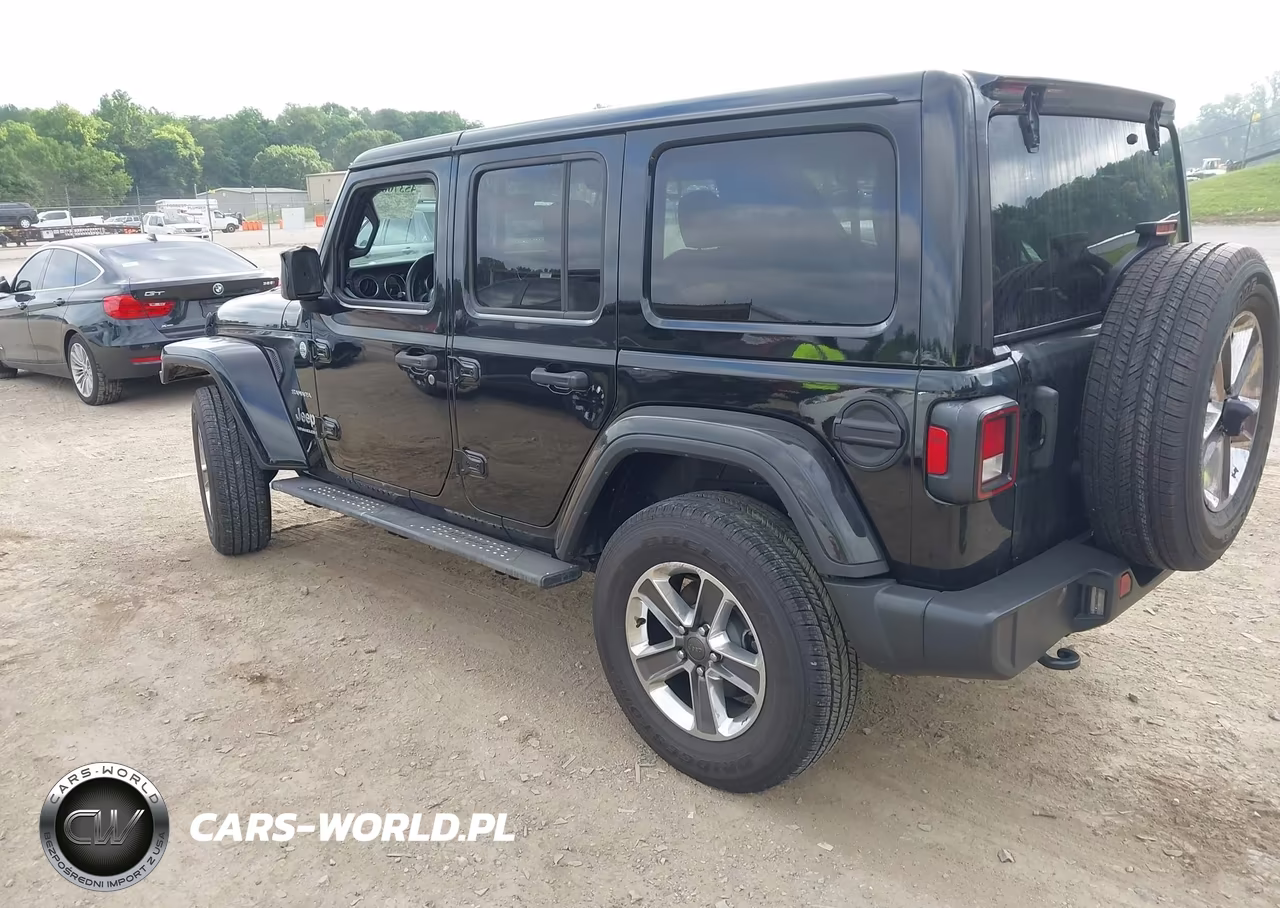 2023 Jeep Wrangler 4-Door Sahara 4X4 VIN:1C4HJXEN6PW570475 - 3