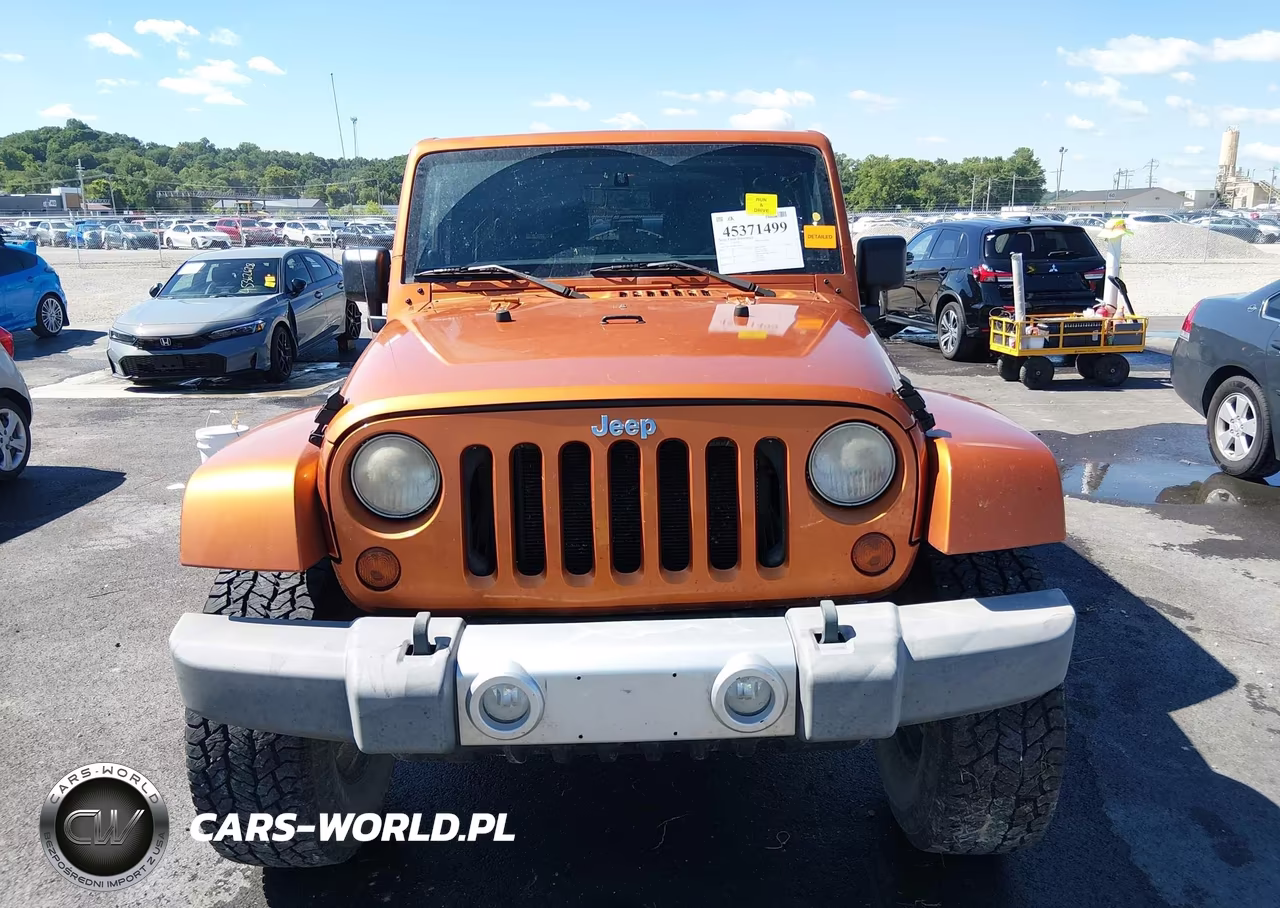 2011 Jeep Wrangler Sahara VIN:1J4AA5D18BL562080 - 12