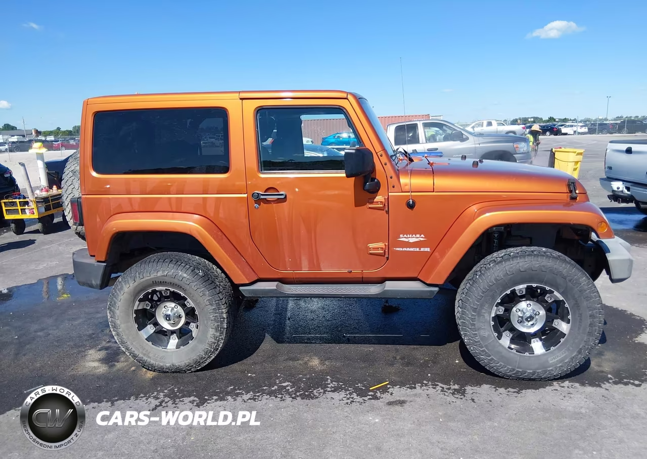 2011 Jeep Wrangler Sahara VIN:1J4AA5D18BL562080 - 13