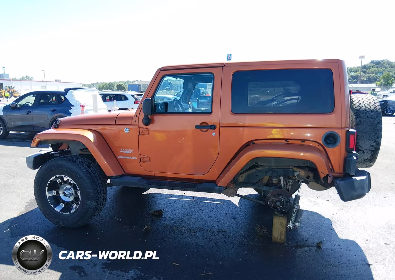 2011 Jeep Wrangler Sahara VIN:1J4AA5D18BL562080 - 14