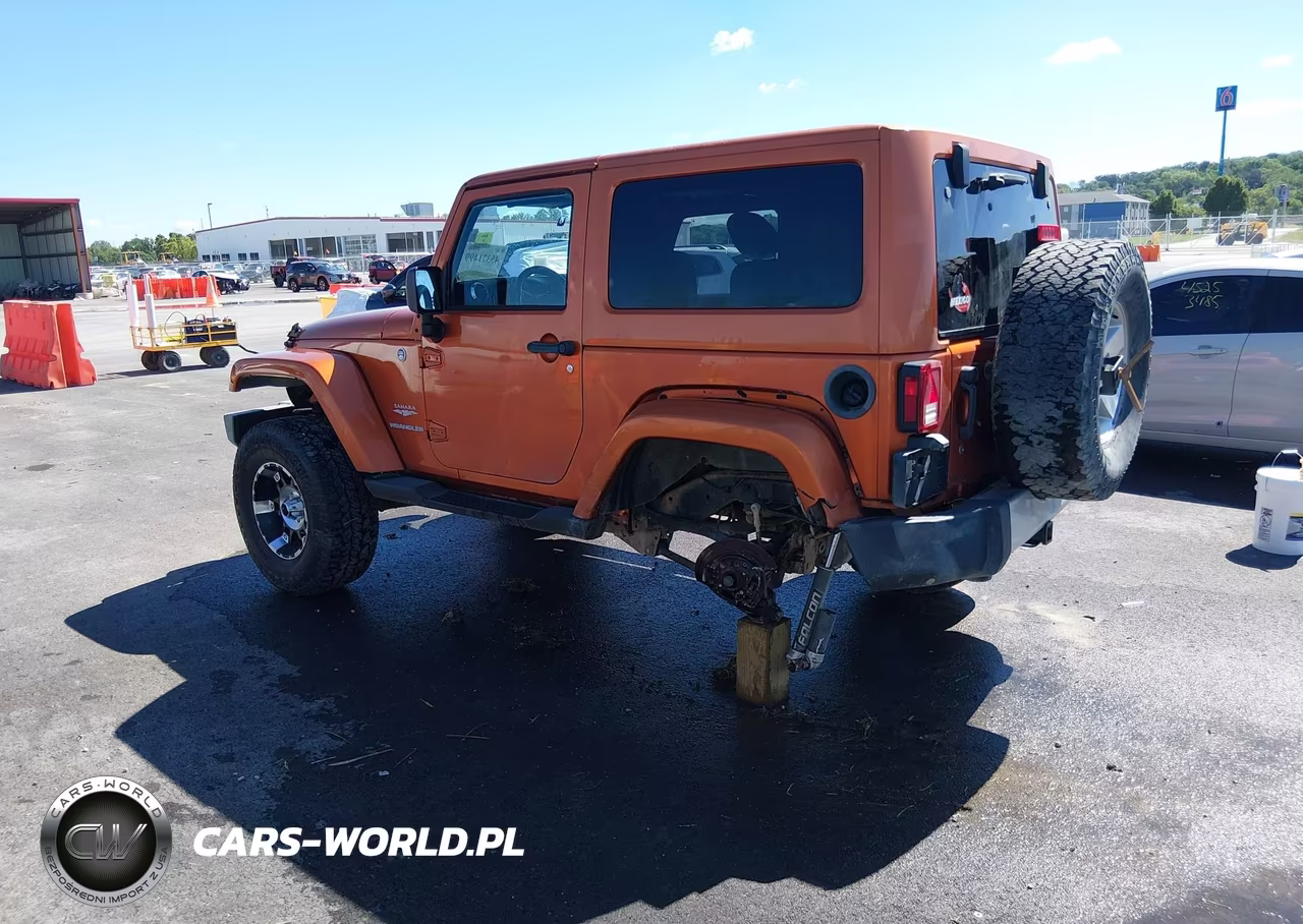 2011 Jeep Wrangler Sahara VIN:1J4AA5D18BL562080 - 3