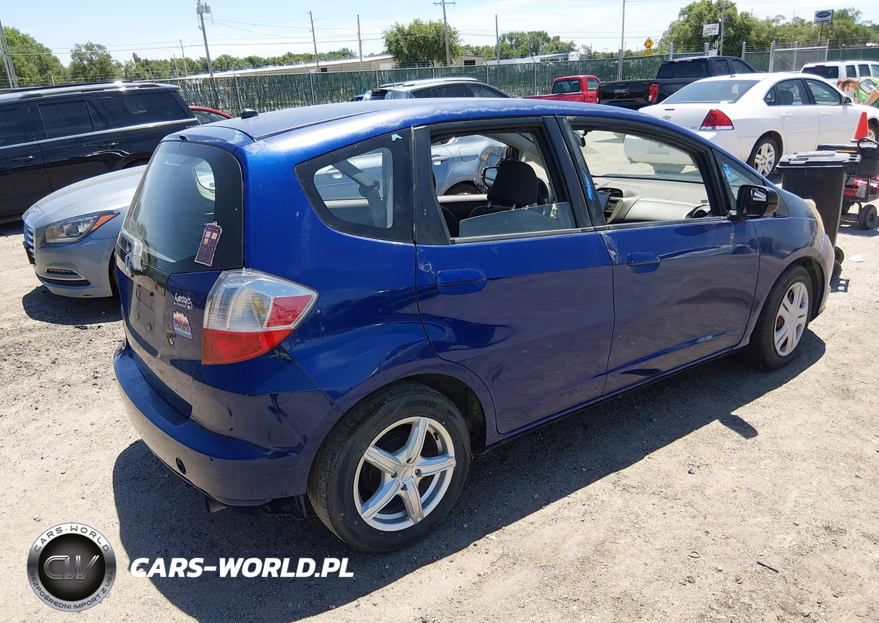 2009 Honda Fit VIN:JHMGE882X9S051896 - 4