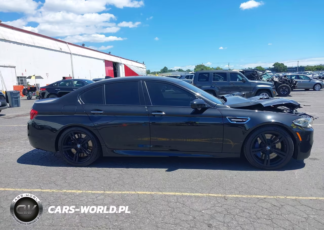 2015 BMW M5 VIN:WBSFV9C55FD594490 - 13