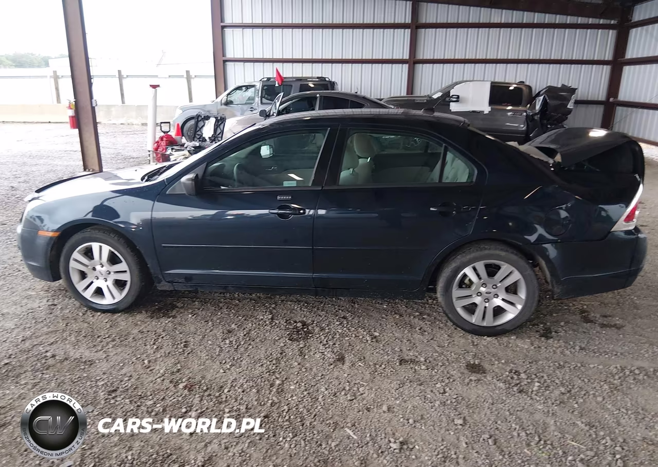 2009 Ford Fusion S VIN:3FAHP06Z69R196954 - 14