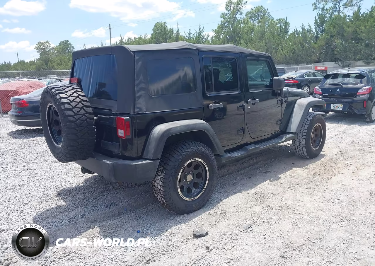 2010 Jeep Wrangler Unlimited Sport VIN:1J4BA3H14AL127011 - 4