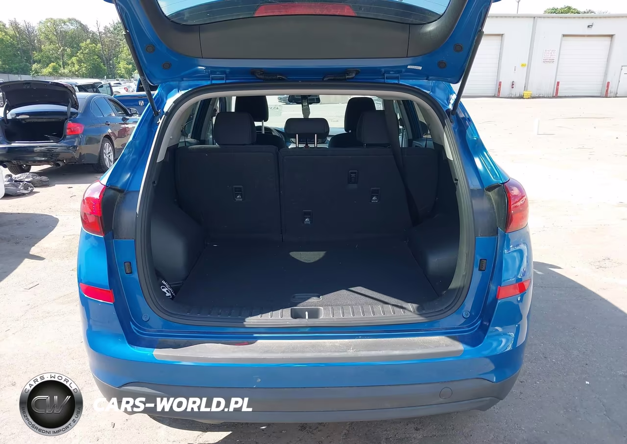2019 Hyundai Tucson Value VIN:KM8J3CA40KU038415 - 19