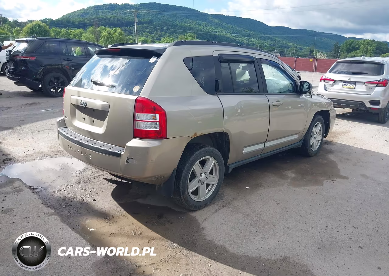 2010 Jeep Compass Sport VIN:1J4NF1FB1AD623358 - 4