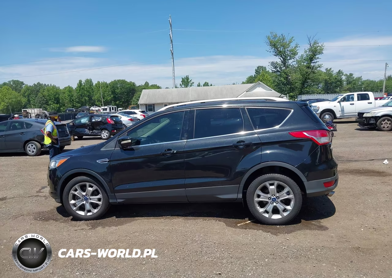2015 Ford Escape Titanium VIN:1FMCU9J92FUB25422 - 14