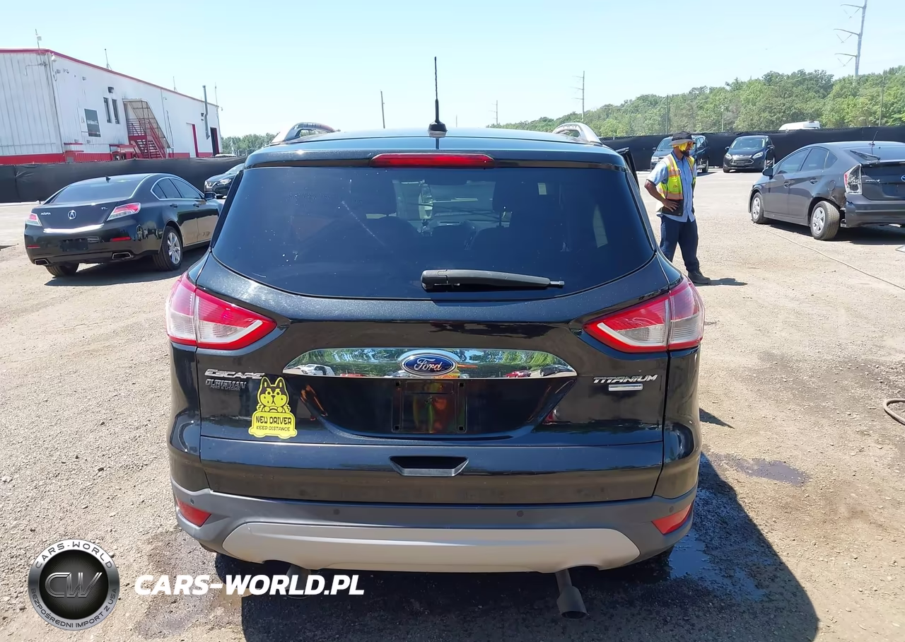 2015 Ford Escape Titanium VIN:1FMCU9J92FUB25422 - 16