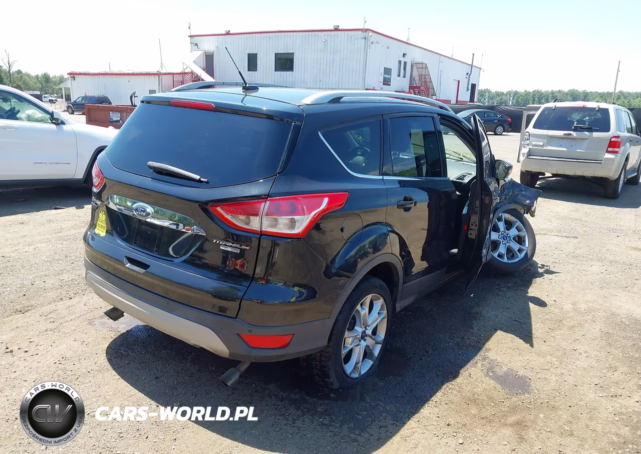 2015 Ford Escape Titanium VIN:1FMCU9J92FUB25422 - 4