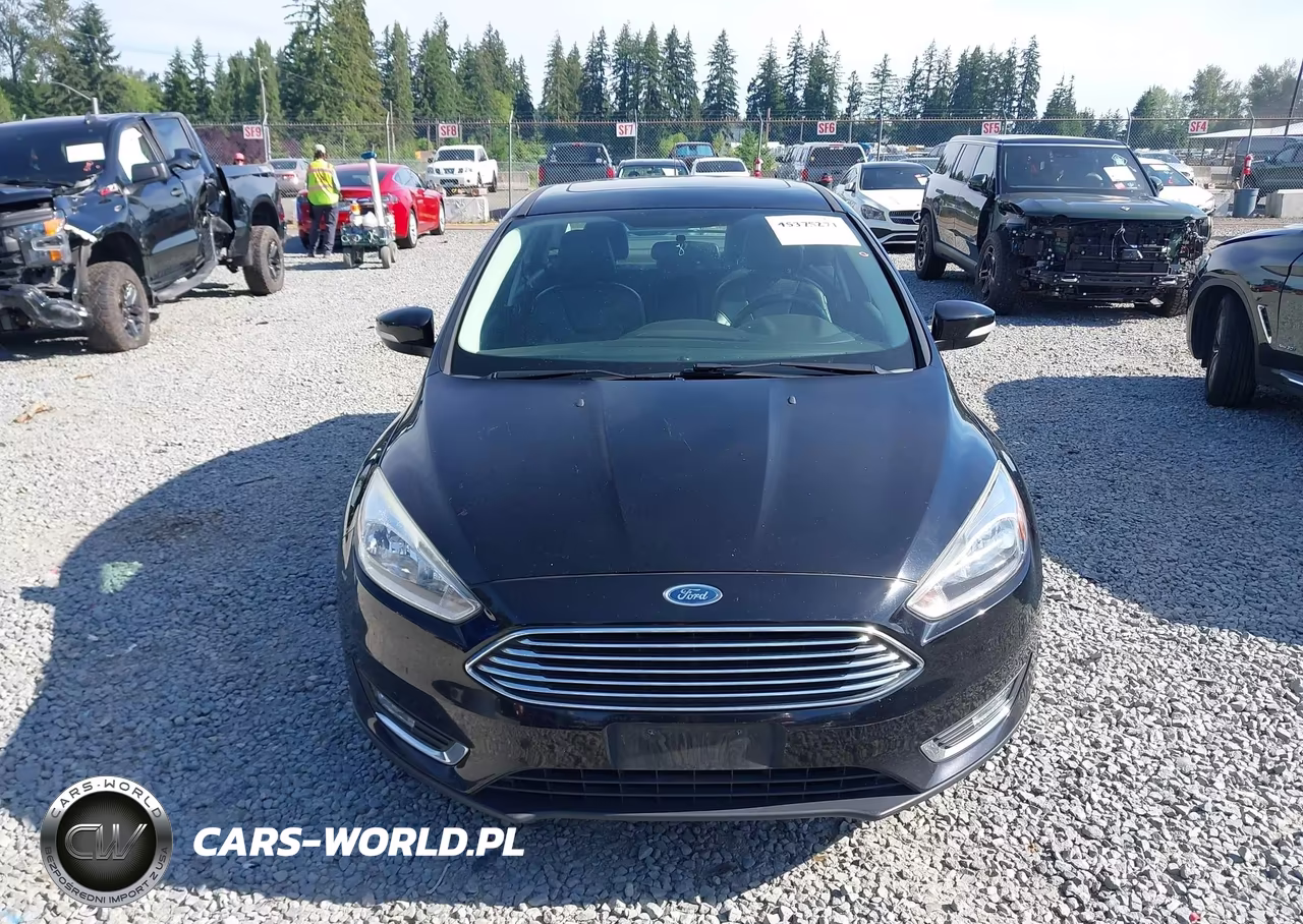 2017 Ford Focus Titanium VIN:1FADP3J2XHL272621 - 13