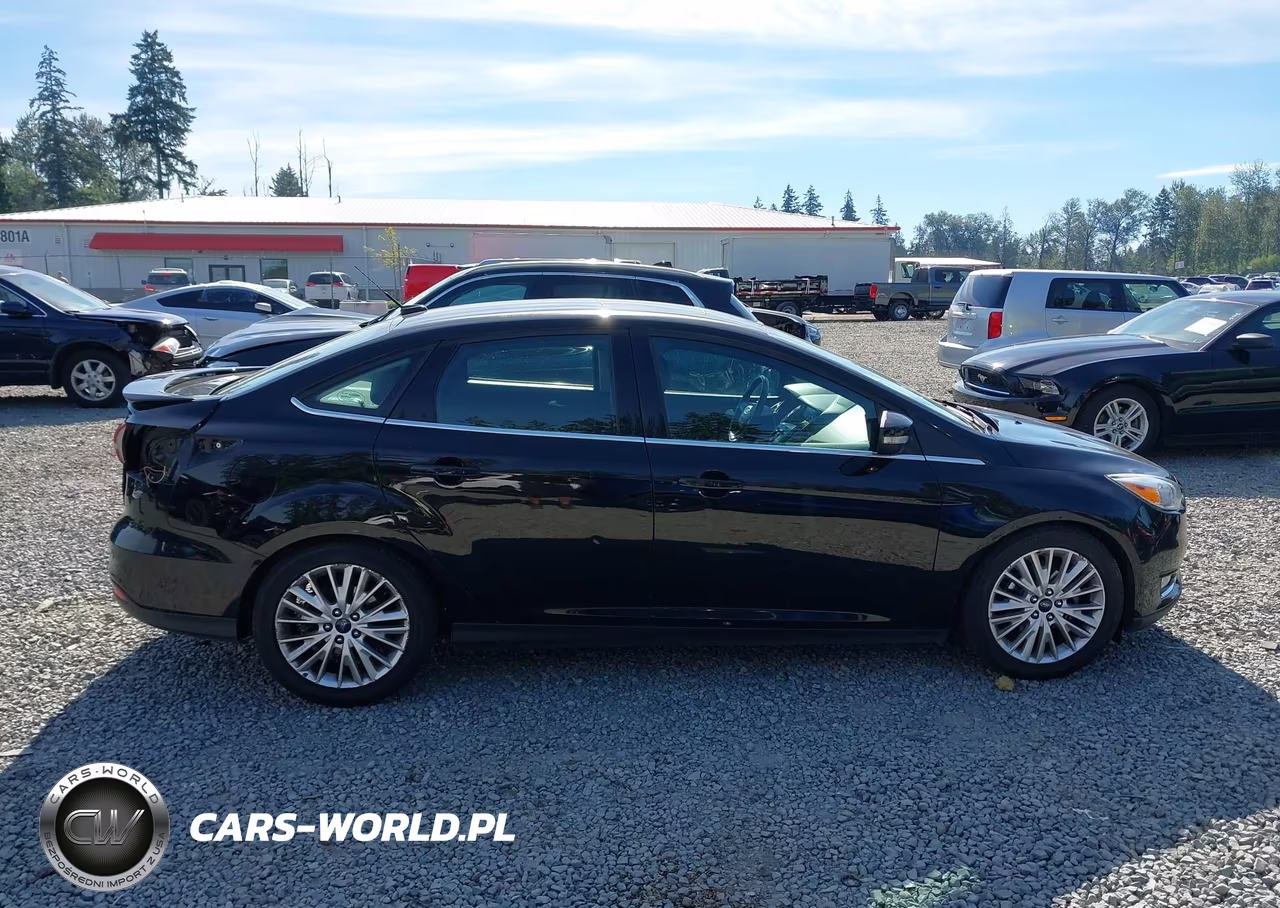 2017 Ford Focus Titanium VIN:1FADP3J2XHL272621 - 14