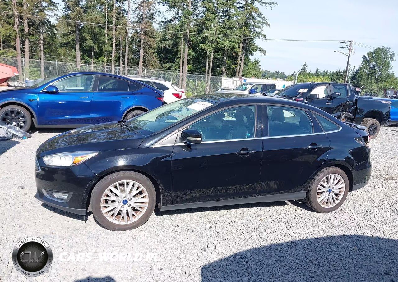 2017 Ford Focus Titanium VIN:1FADP3J2XHL272621 - 15