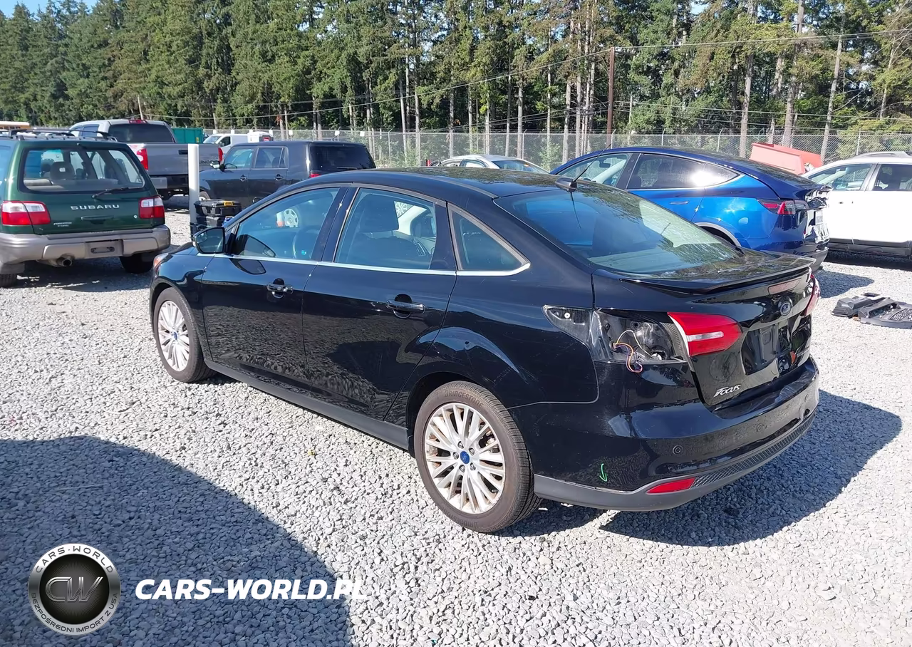2017 Ford Focus Titanium VIN:1FADP3J2XHL272621 - 3