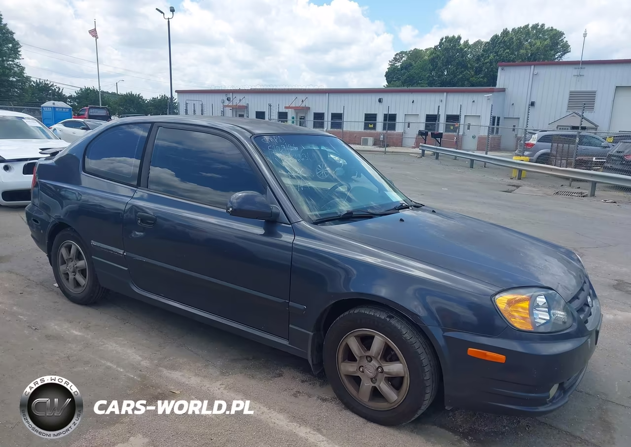 2005 Hyundai Accent Gls-Gt VIN:KMHCG35C95U366631 - 13