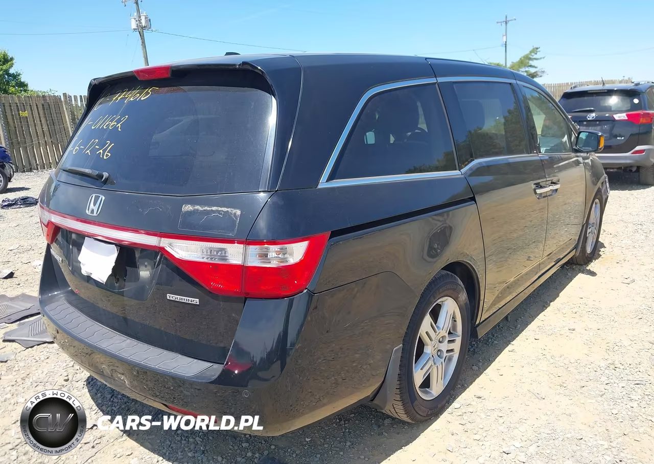 2011 Honda Odyssey Touring-Touring Elite VIN:5FNRL5H97BB011662 - 4
