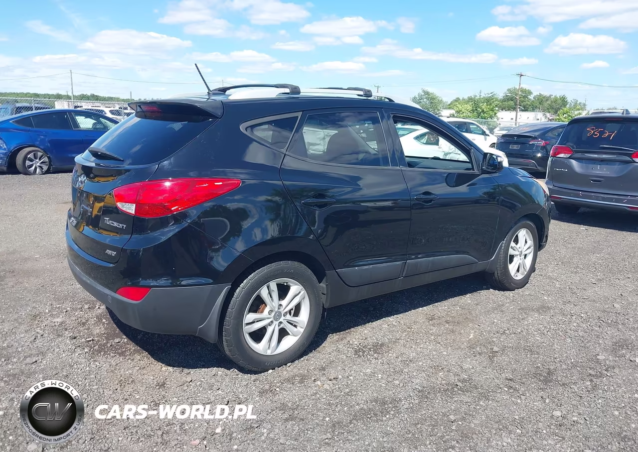 2012 Hyundai Tucson Gls VIN:KM8JUCAC5CU541850 - 4