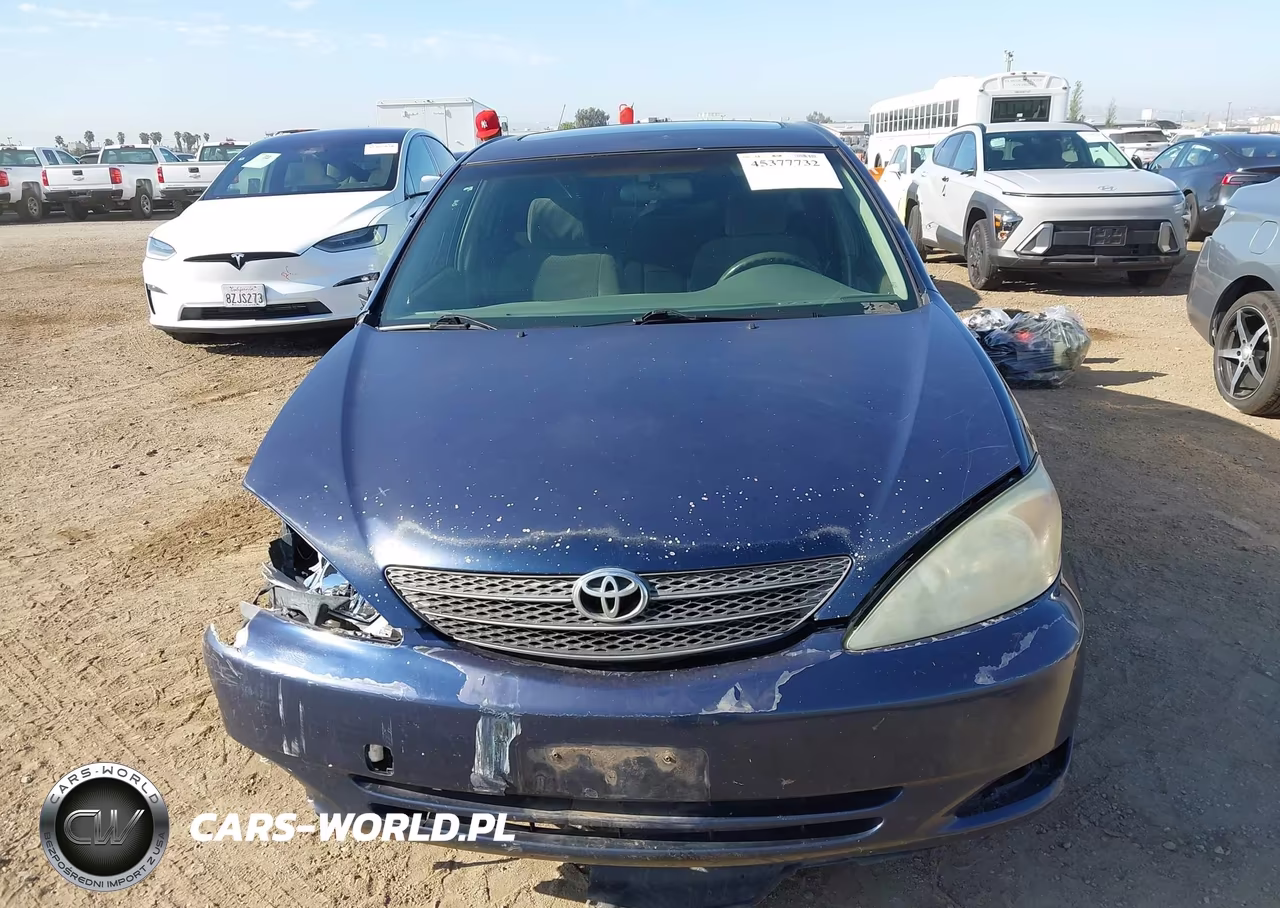 2002 Toyota Camry Le VIN:JTDBE32K420078777 - 13