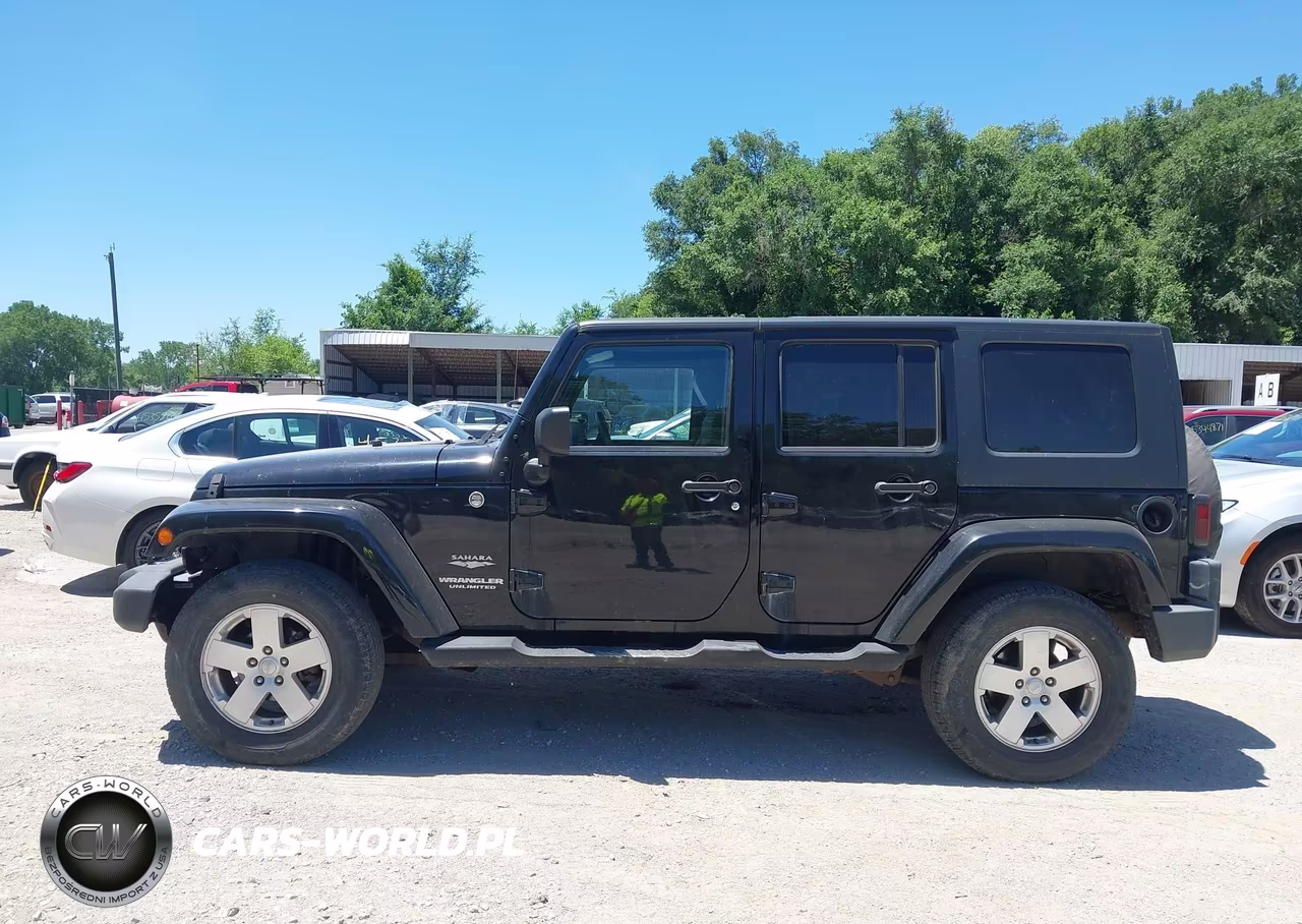 2007 Jeep Wrangler Unlimited Sahara VIN:1J8GA59157L194515 - 14