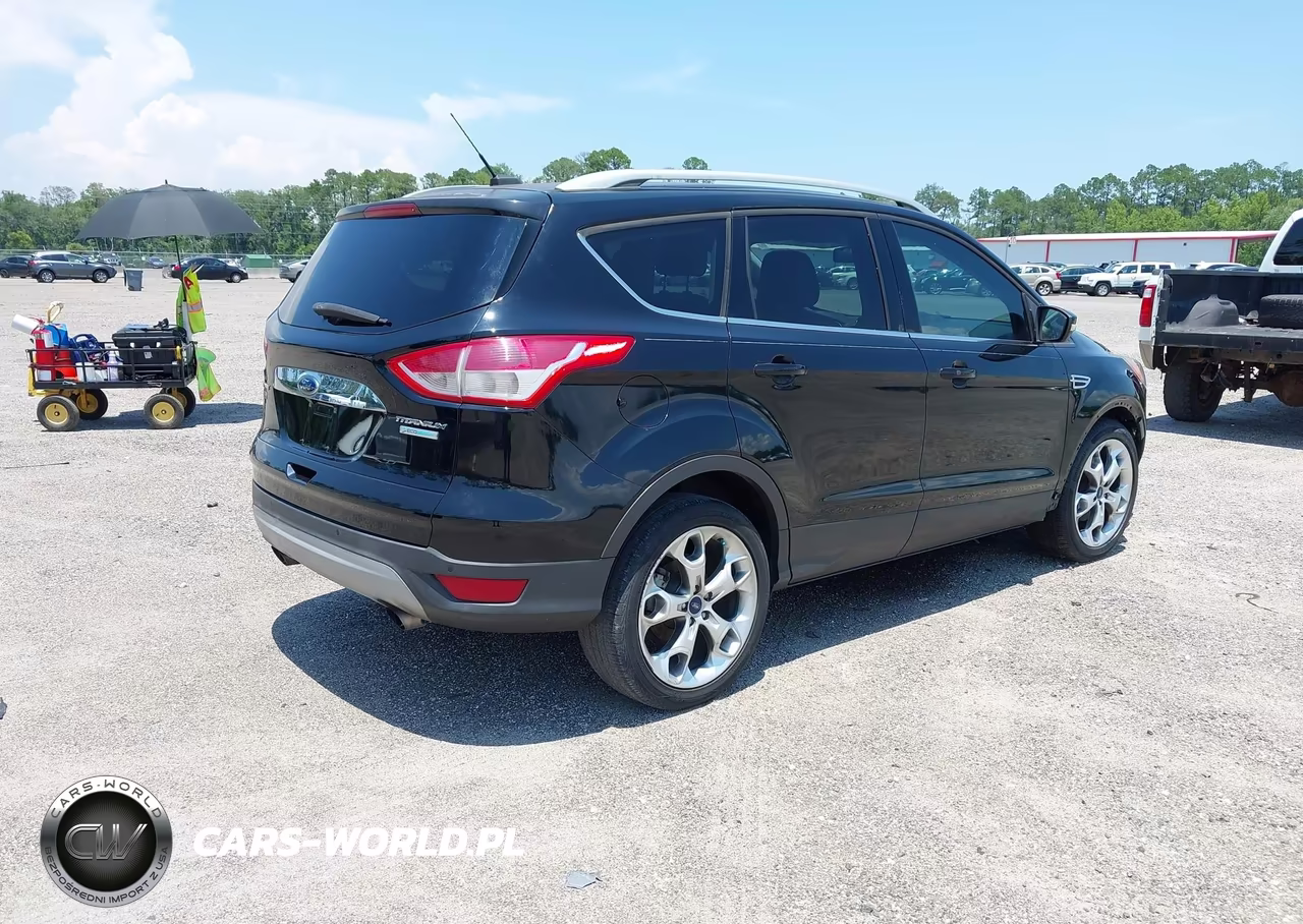 2016 Ford Escape Titanium VIN:1FMCU0JX7GUB12001 - 4