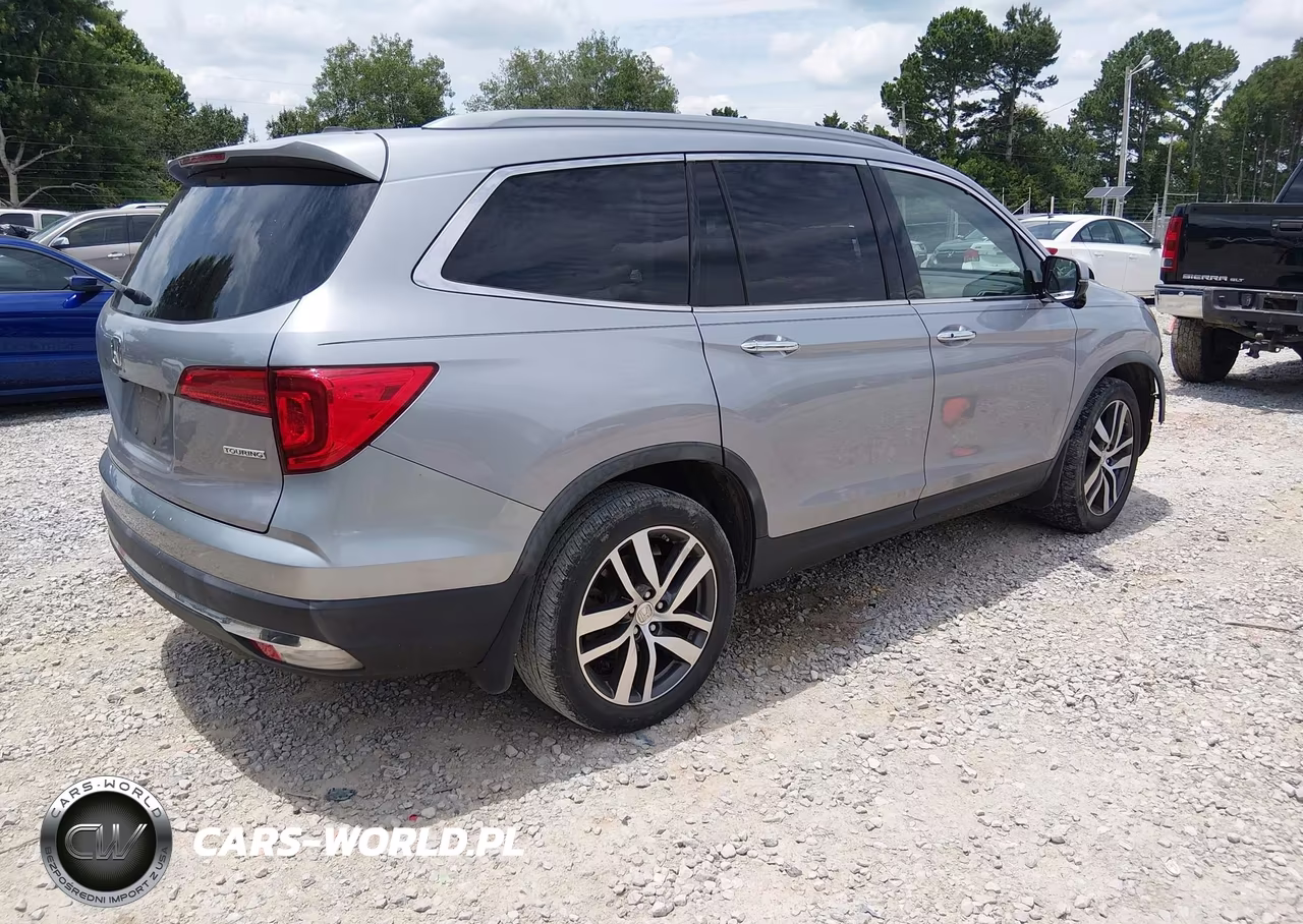 2017 Honda Pilot Touring VIN:5FNYF5H96HB043448 - 4