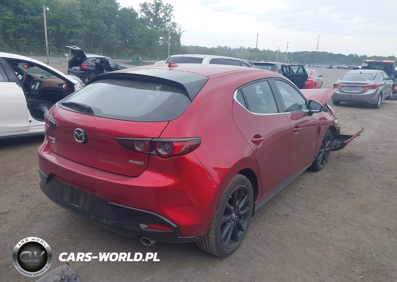 2019 Mazda Mazda3 Premium Package VIN:JM1BPBNM8K1143836 - 4