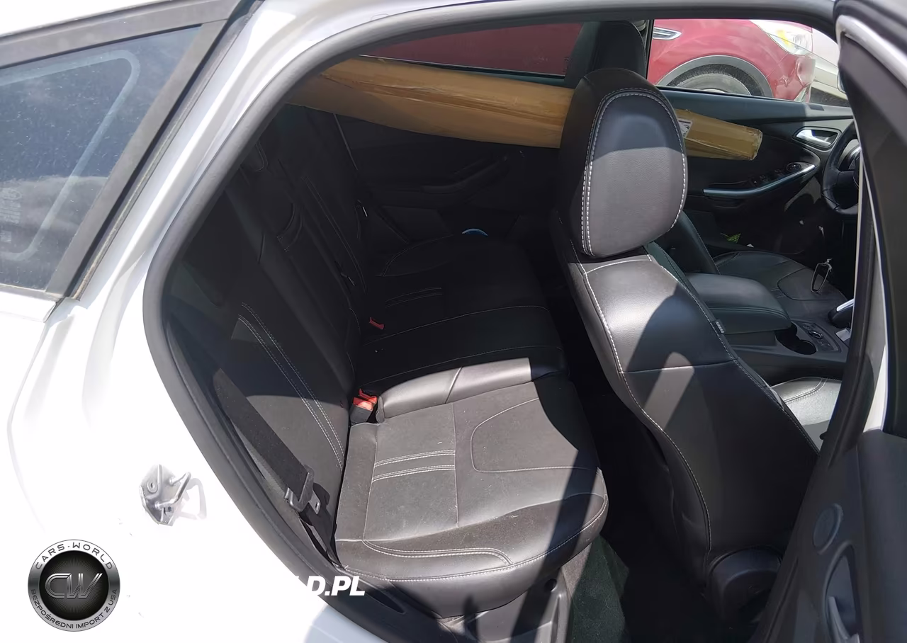 2013 Ford Focus Titanium VIN:1FADP3N28DL301392 - 8