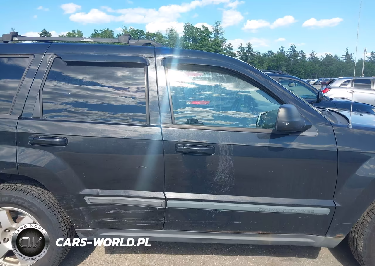 2009 Jeep Grand Cherokee Laredo VIN:1J8GR48K39C526452 - 6