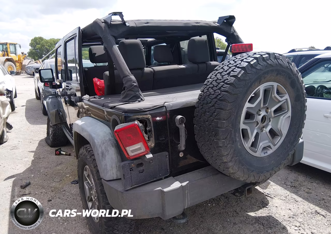 2012 Jeep Wrangler Unlimited Sport VIN:1C4BJWDG3CL164068 - 3