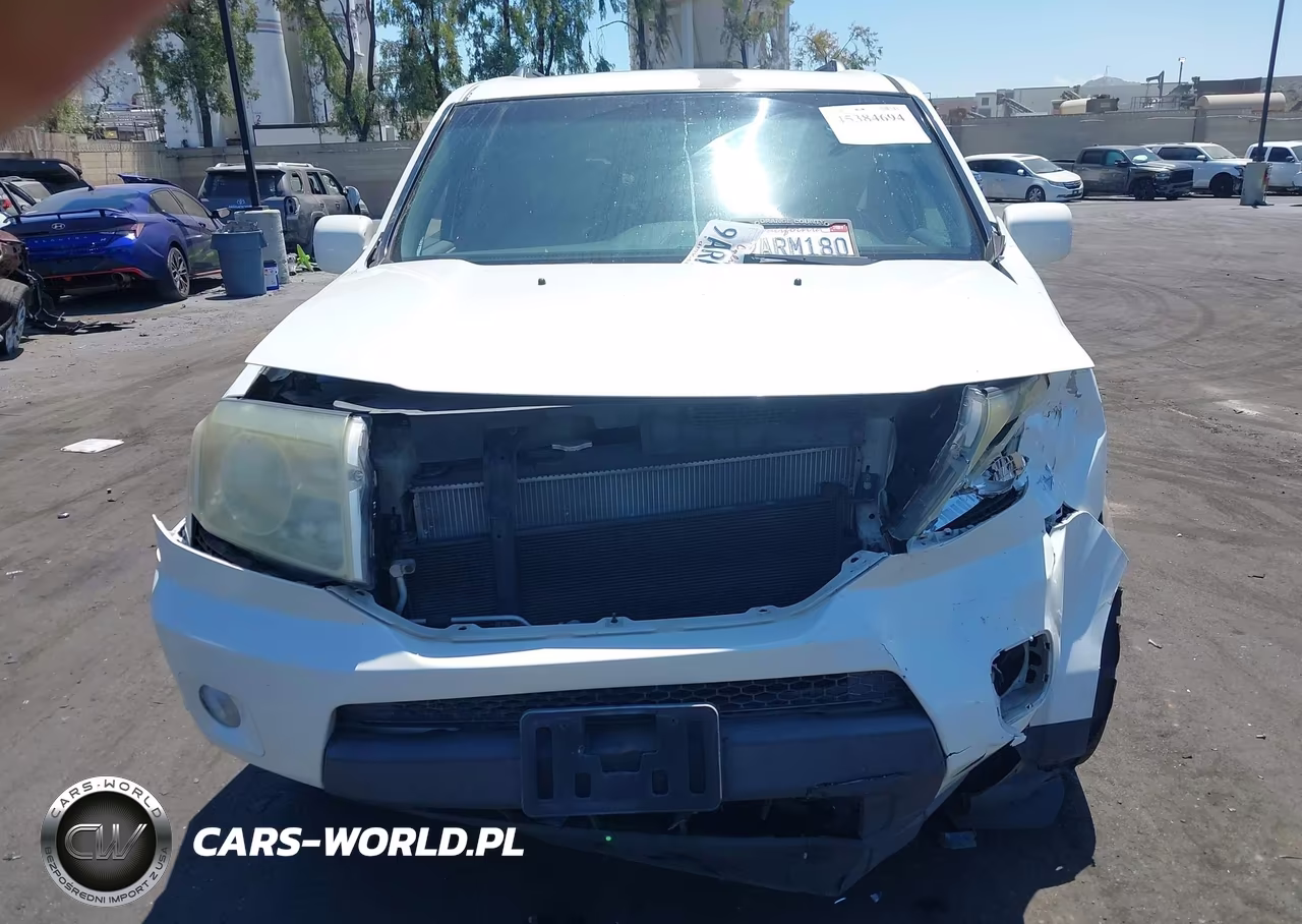 2011 Honda Pilot Touring VIN:5FNYF3H95BB013904 - 13