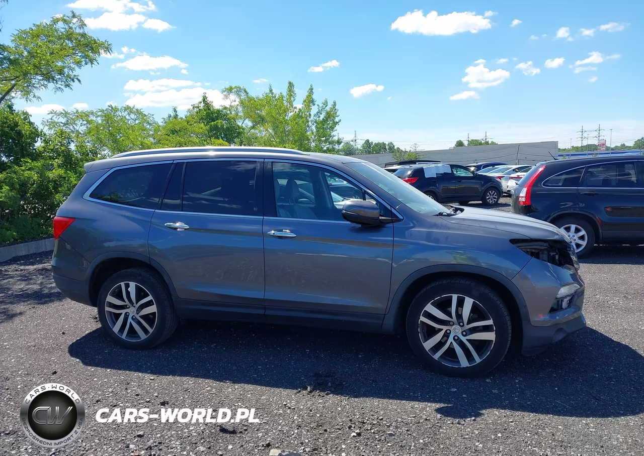 2016 Honda Pilot Elite VIN:5FNYF6H00GB110731 - 13