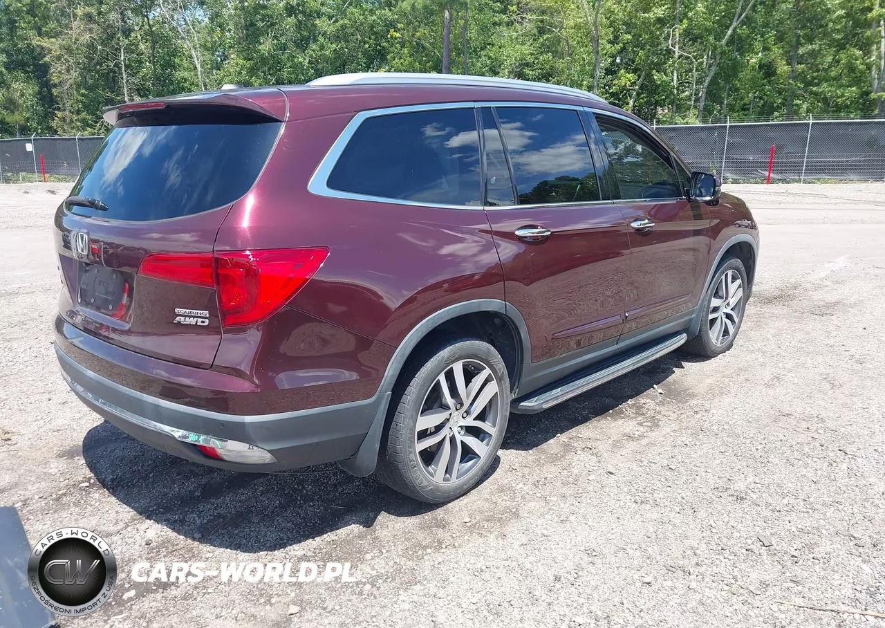 2017 Honda Pilot Touring VIN:5FNYF6H99HB077597 - 4