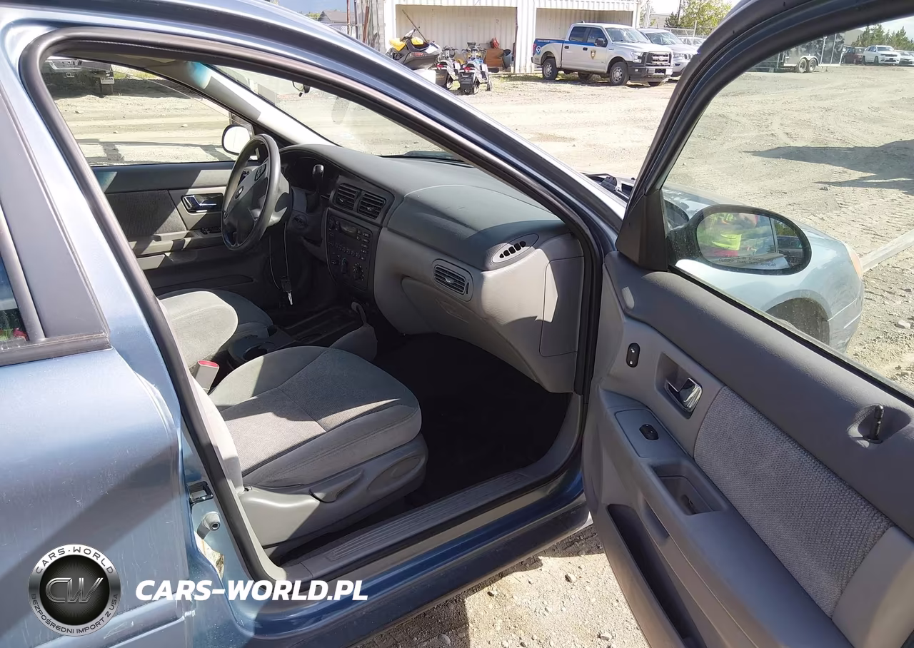 2000 Ford Taurus Lx VIN:1FAFP5224YG277809 - 5