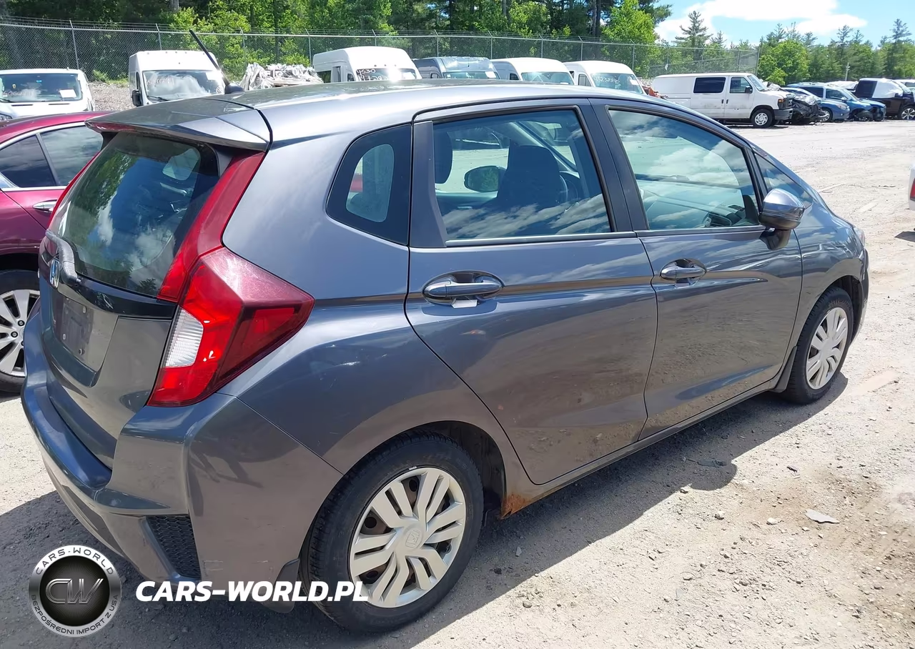 2015 Honda Fit Lx VIN:3HGGK5H5XFM710813 - 4