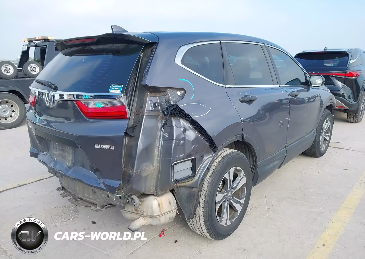 2018 Honda Cr-V Lx VIN:2HKRW5H31JH423868 - 4