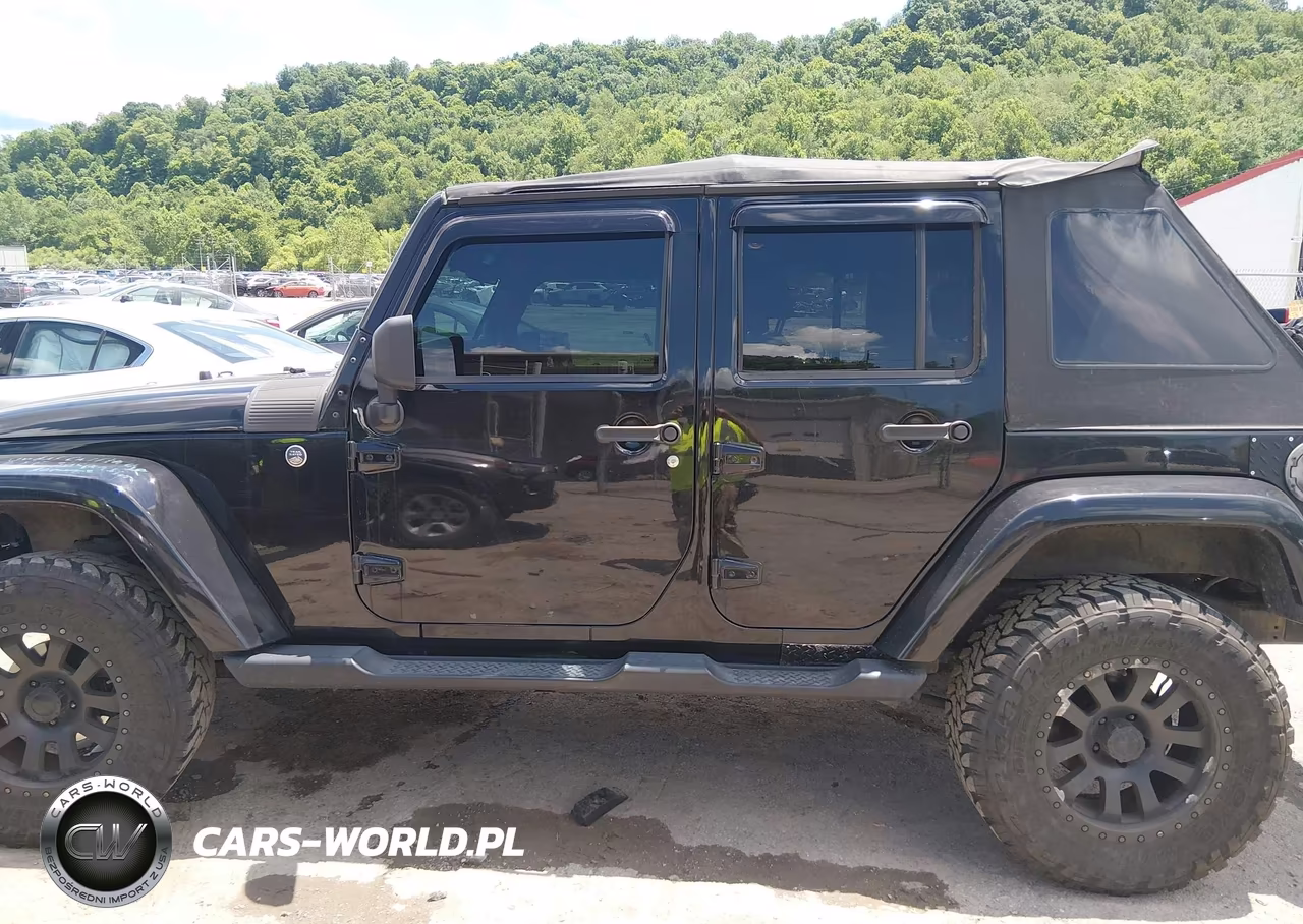 2009 Jeep Wrangler Unlimited Sahara VIN:1J4GA59129L709085 - 14