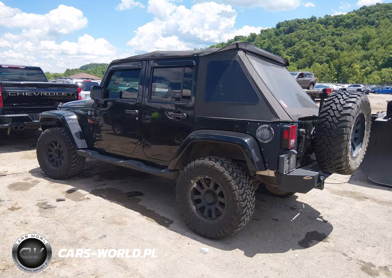 2009 Jeep Wrangler Unlimited Sahara VIN:1J4GA59129L709085 - 3