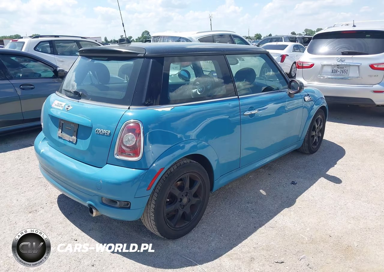 2009 Mini Cooper VIN:WMWMF33579TW76575 - 4